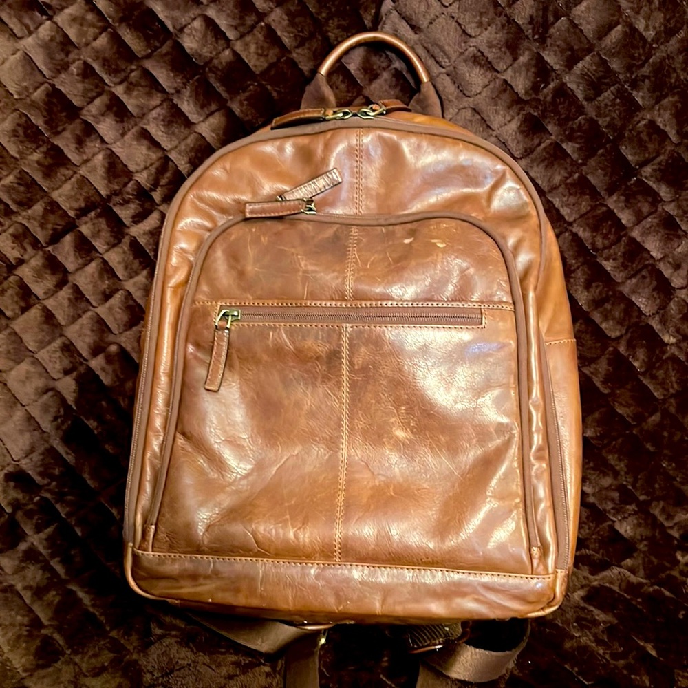 Jos.A.Bank leather backpack , used maybe 4 twice max and pretty much new.